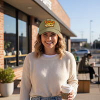 Load image into Gallery viewer, Woman wearing a cap with 'Coffee &amp; Good Vibes' text, holding a coffee cup, standing outside a building.