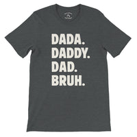 Load image into Gallery viewer, Dada Daddy Dad Bruh tee in dark grey heather, cream stacked text, funny dad shirt