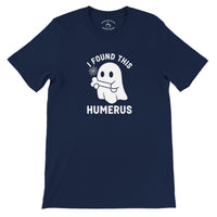 Load image into Gallery viewer, I Found This Humerus Everyday Tee, flat lay showing ghost with bone graphic and collar print in navy blue
